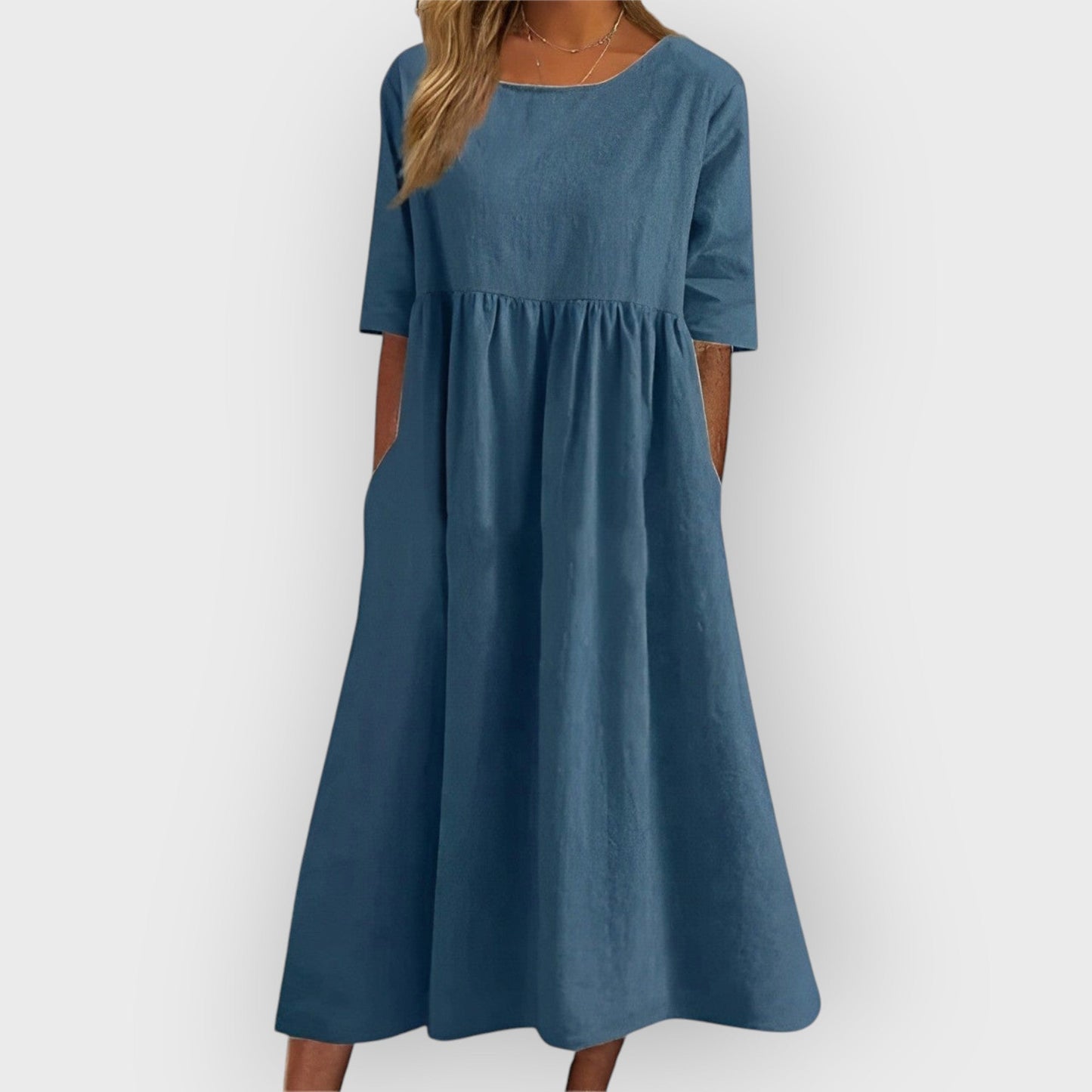 Bríd – Andningsbar vintage-midiklänning med plisserad design