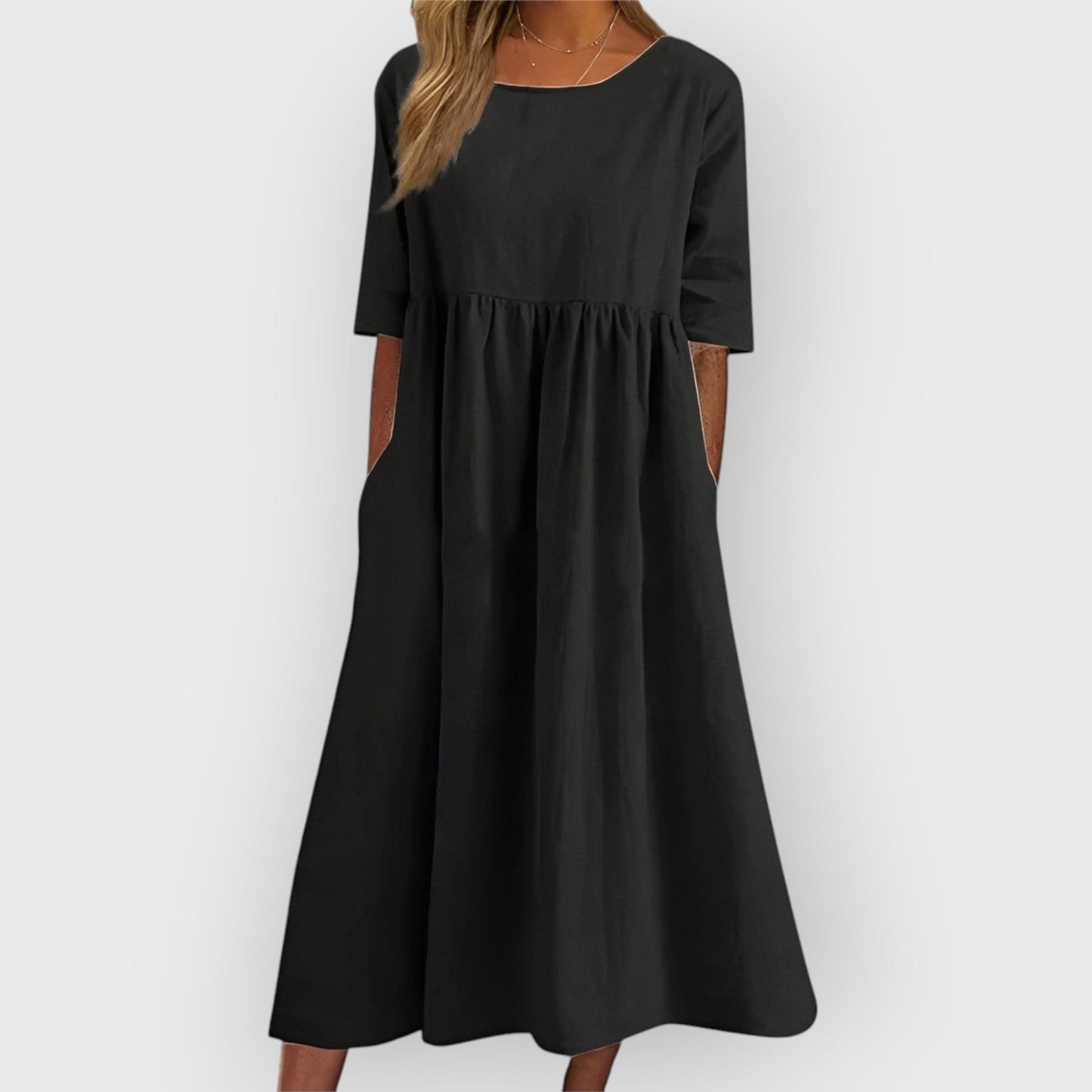 Bríd – Andningsbar vintage-midiklänning med plisserad design