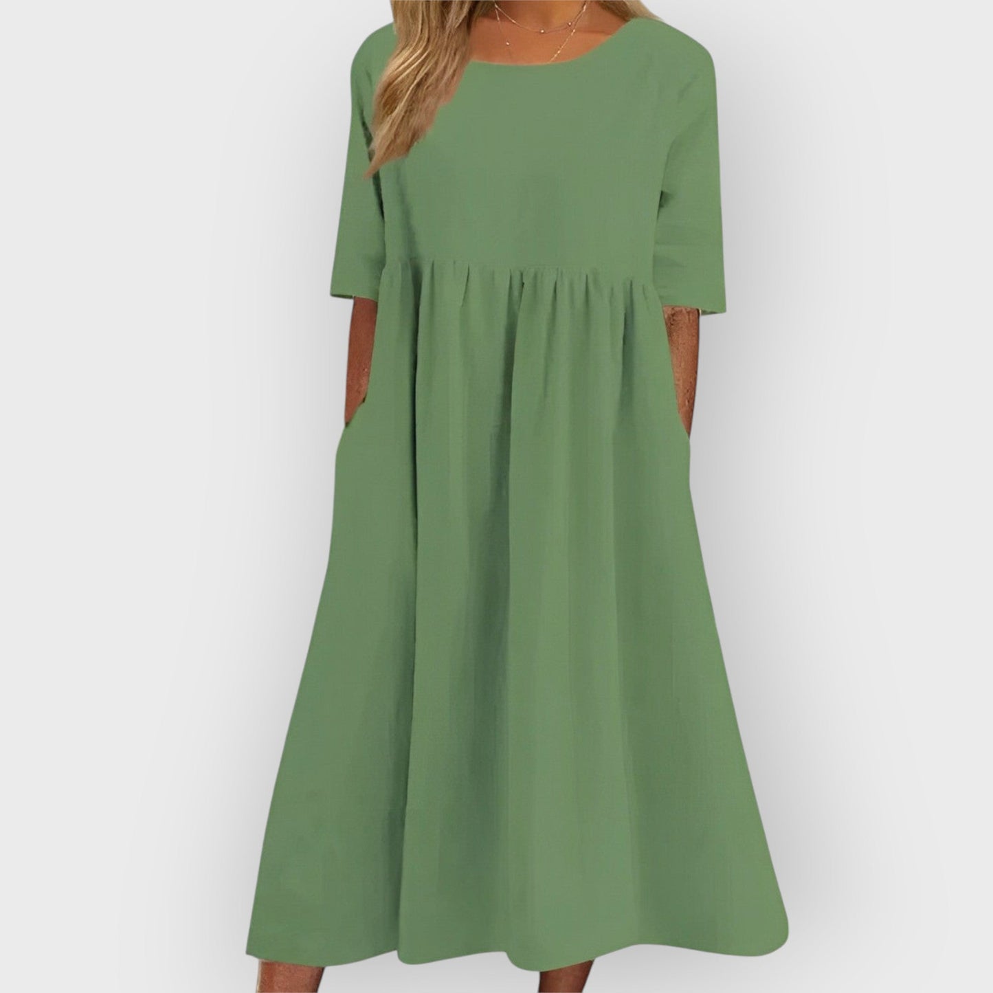 Bríd – Andningsbar vintage-midiklänning med plisserad design