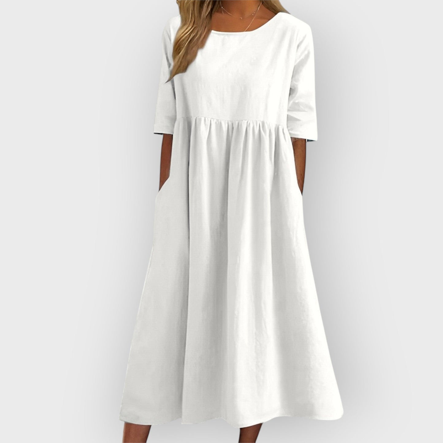 Bríd – Andningsbar vintage-midiklänning med plisserad design